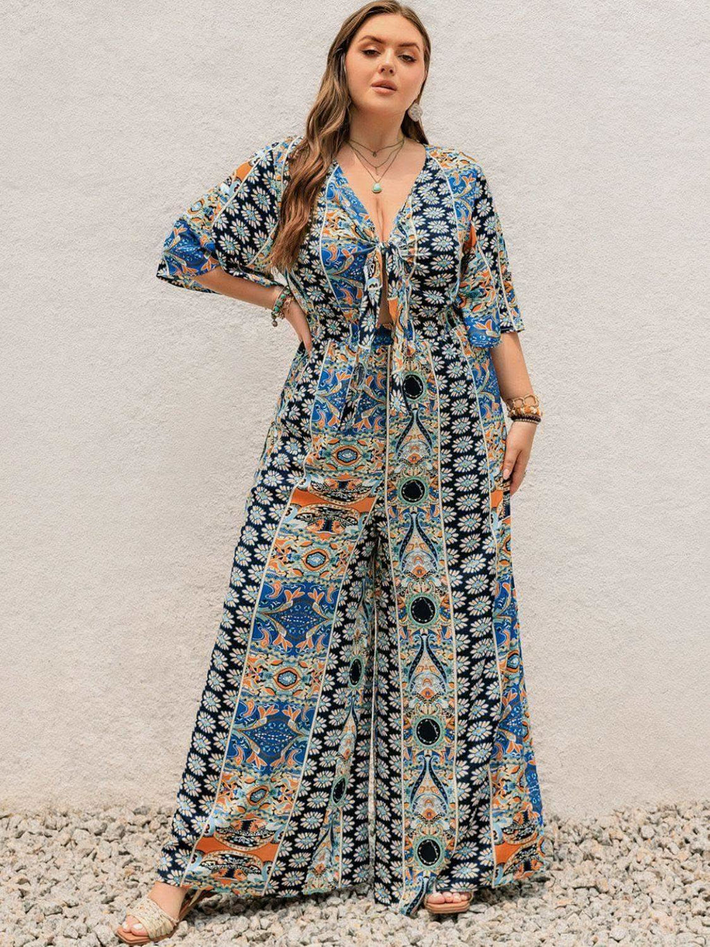 Plus Size Printed Half Sleeve Wide Leg Jumpsuit in - photo