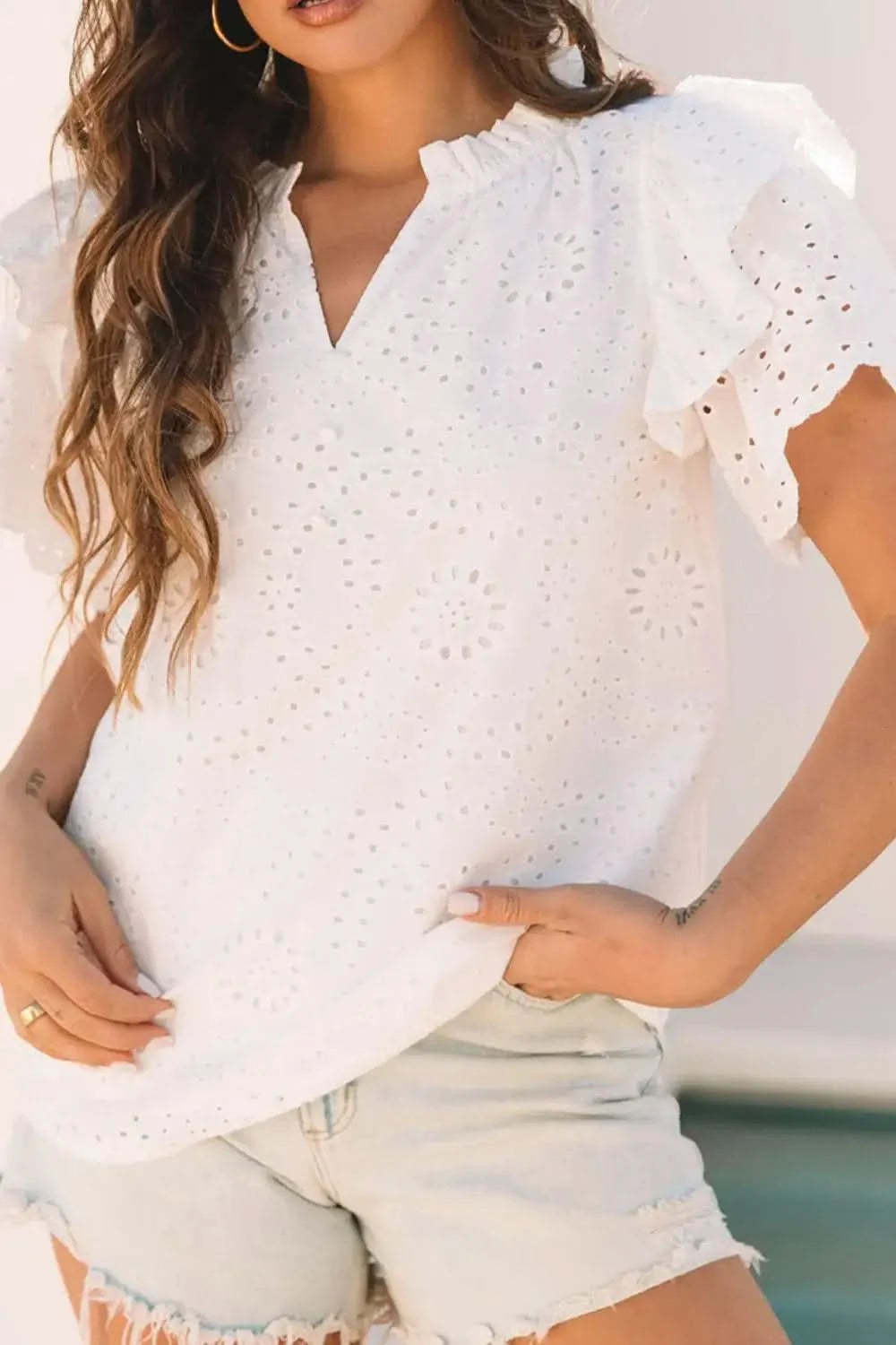 Eyelet Notched Short Sleeve Blouse in - photo