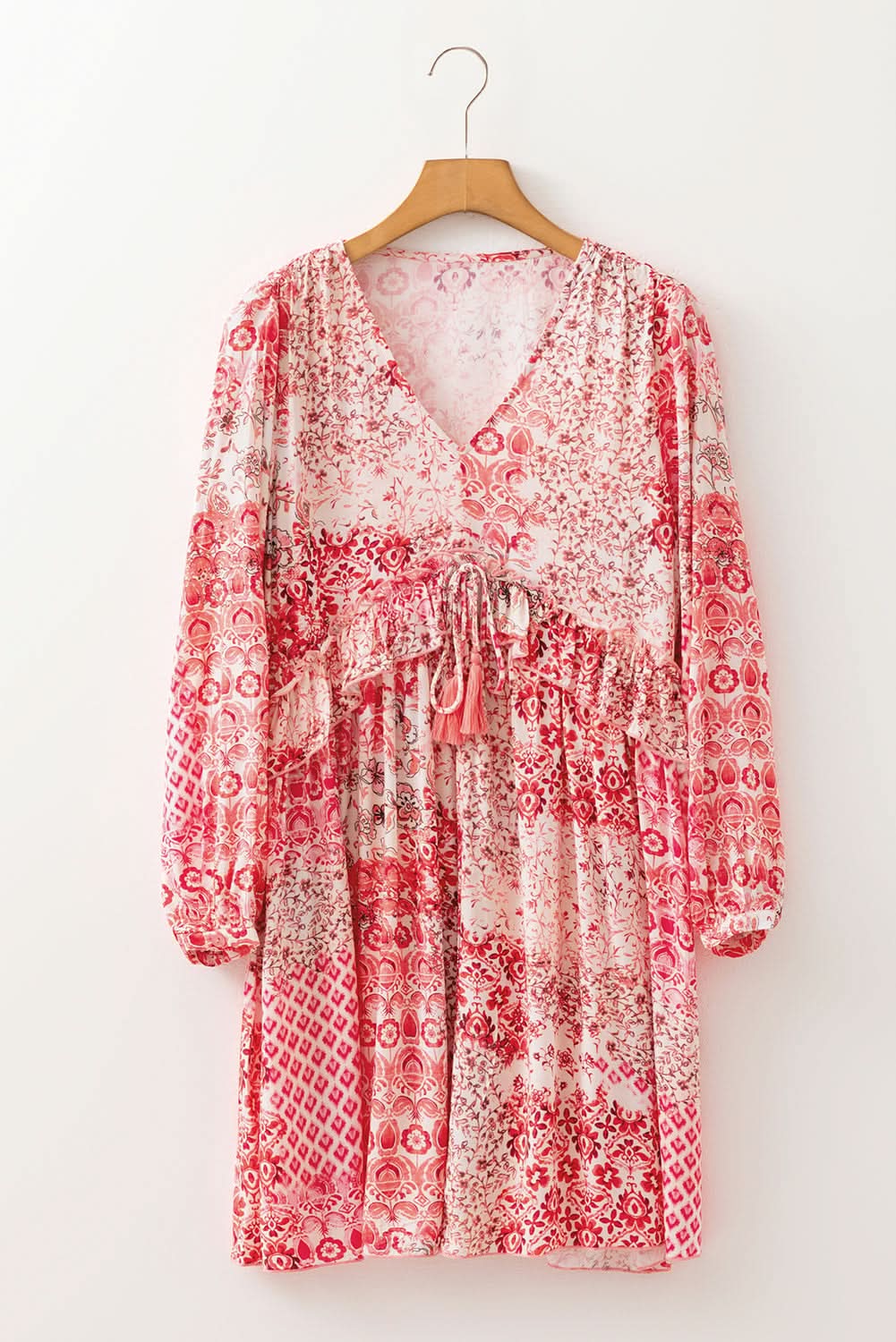 Melody Floral Tassel Tie Long Sleeve Mini Dress in - Dresses/Floral Dresses photo
