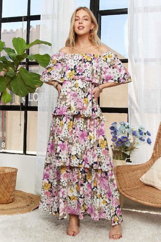 ADORA Layered Floral Off-Shoulder Short Sleeve Maxi Dress in - Dresses photo