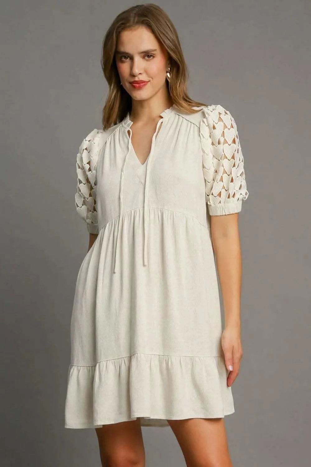 Umgee Full Size Ruffled Hem Heart Lace Sleeve Tie Neck Dress Plus Size in Oatmeal - photo