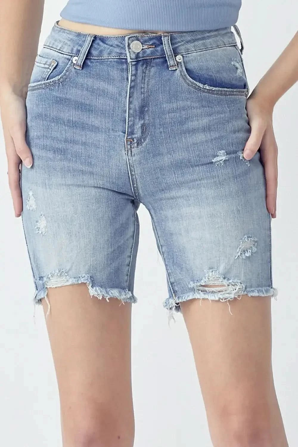 RISEN High Rise Distressed Denim Shorts in Light - Shorts photo