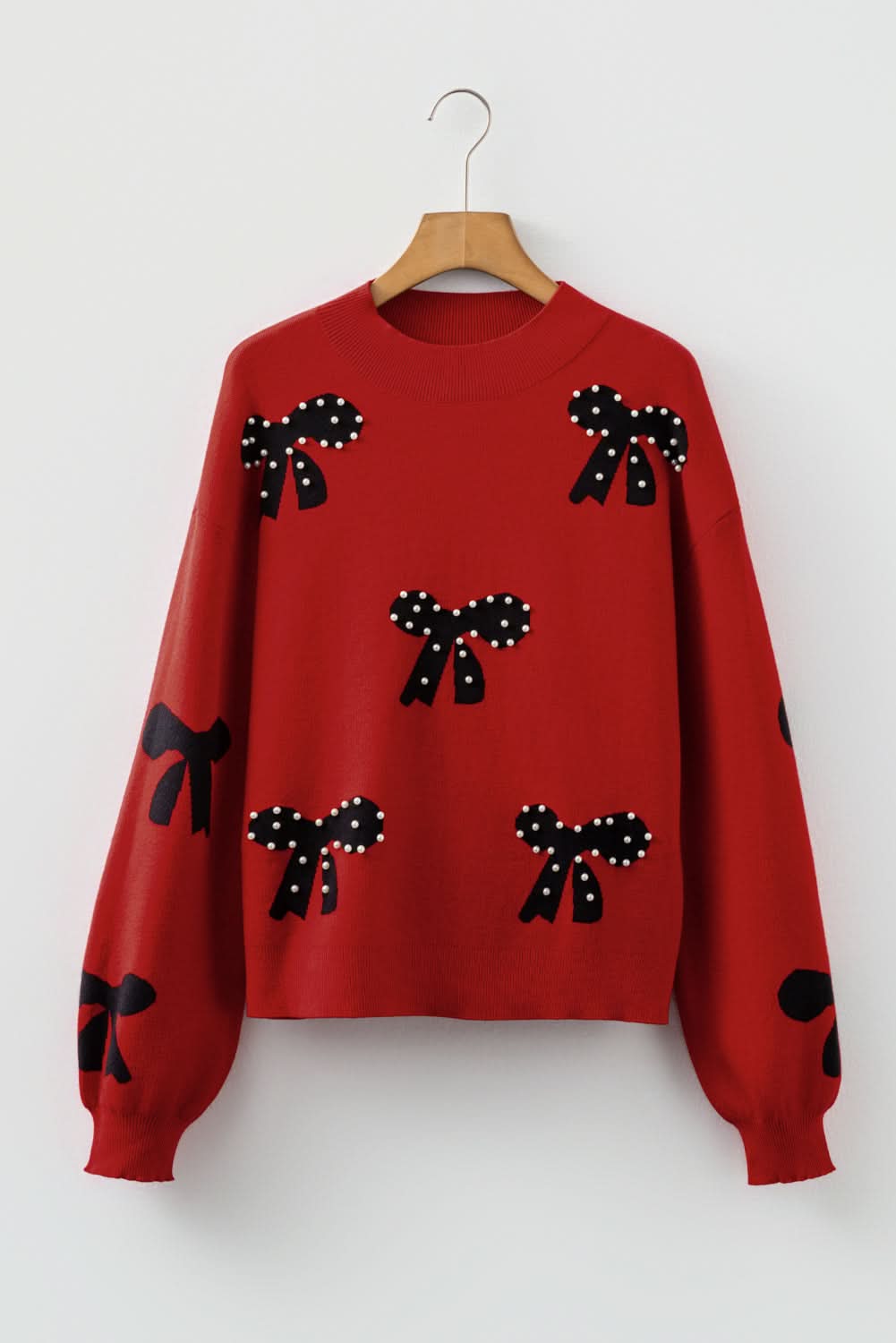 Eleanor Bow Pattern Loose Sweater in - Sweaters photo