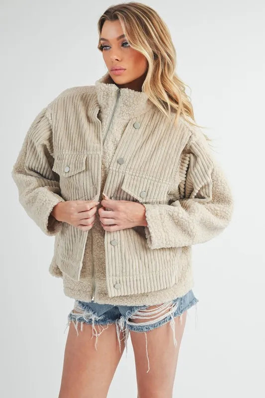 Aemi + Co Fake Two Pieces Turtleneck Sherpa Jacket with Pockets in - photo