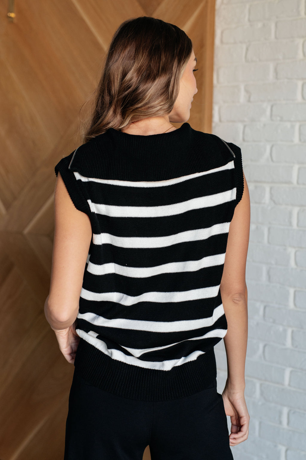 Attached at the Hip 1/4 Zip Sleeveless Sweater in - Tops photo
