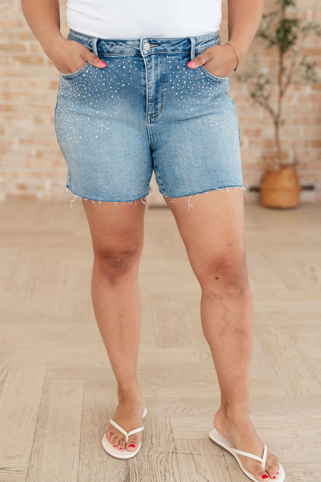 Elle High Rise Rhinestone Cutoff Shorts in - Denim photo
