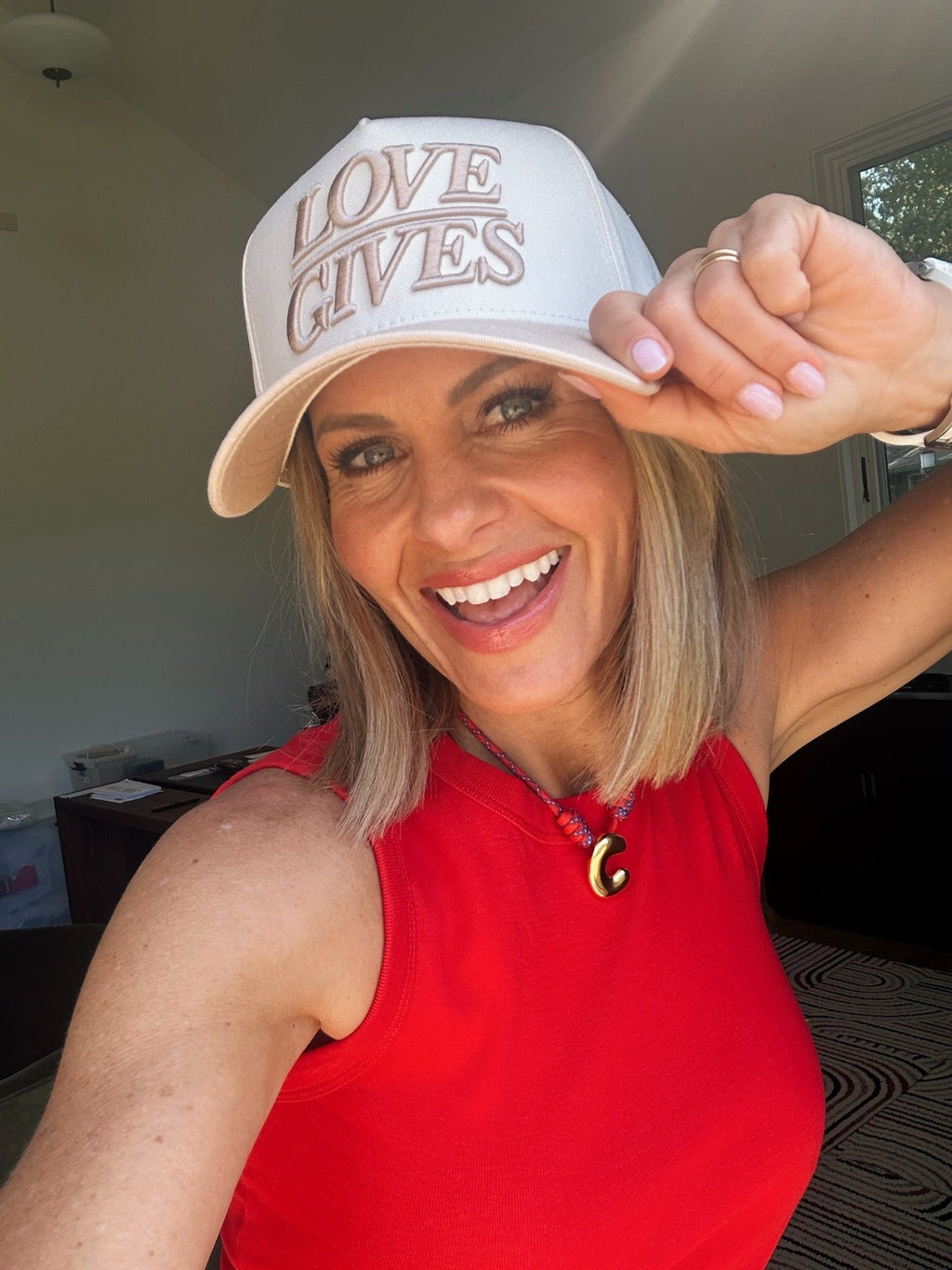 LOVE GIVES Hat in - Merch photo