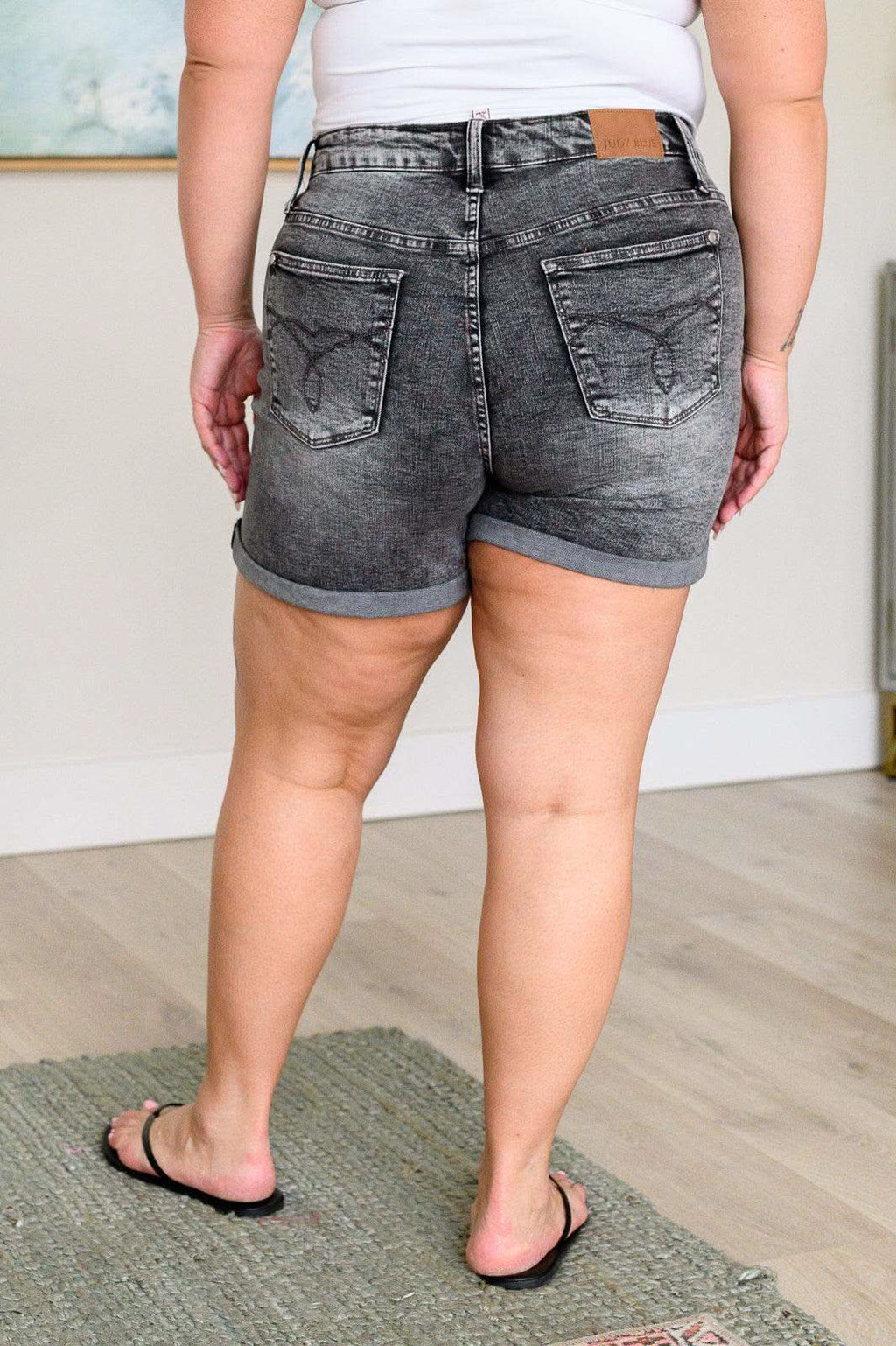 Greyson High Rise Button Fly Cuffed Shorts in - Denim photo