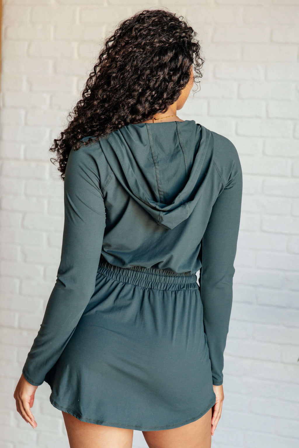 Getting Out Long Sleeve Hoodie Romper in Smoked Spruce in - Jumpsuits & Rompers photo