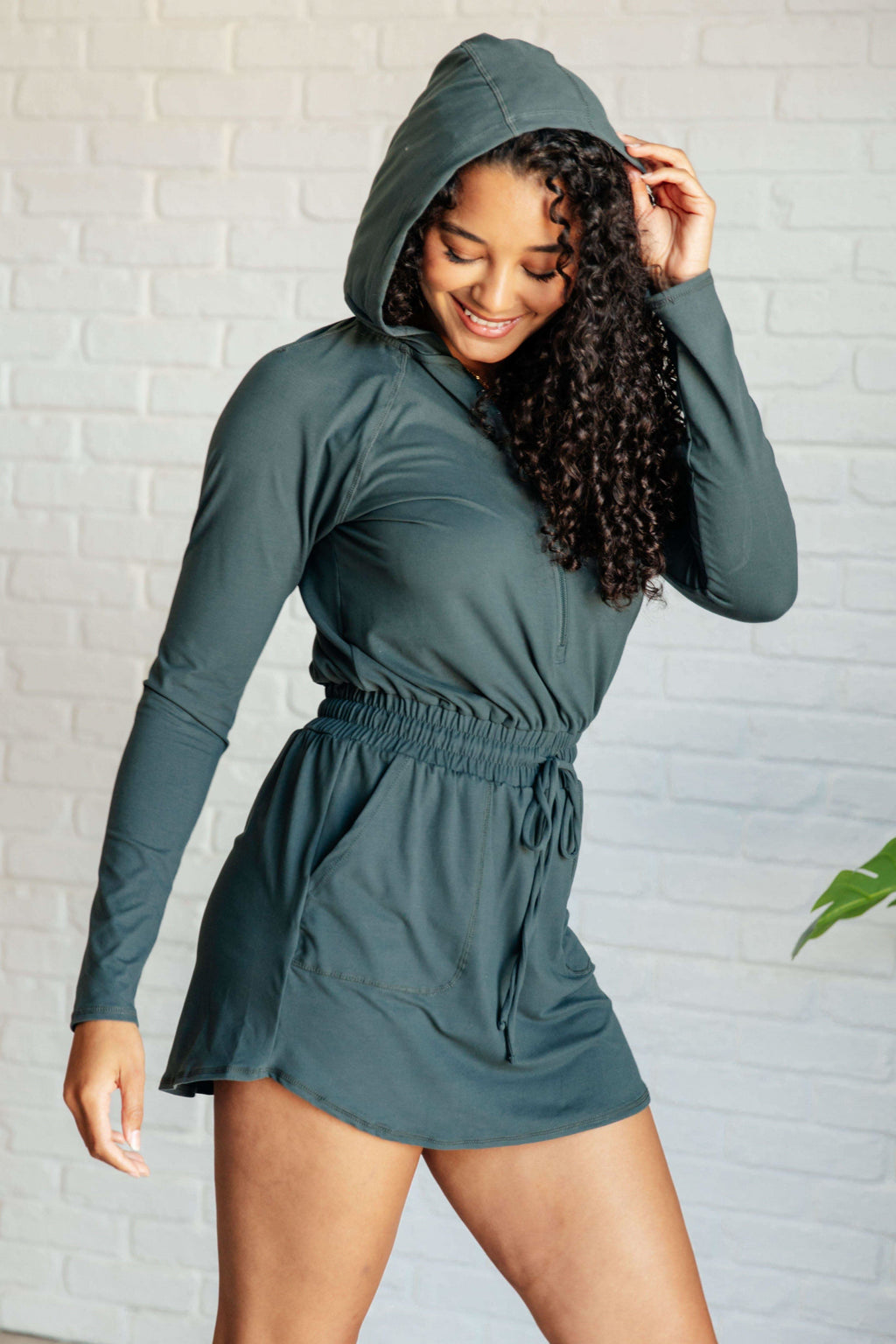 Getting Out Long Sleeve Hoodie Romper in Smoked Spruce in - Jumpsuits & Rompers photo