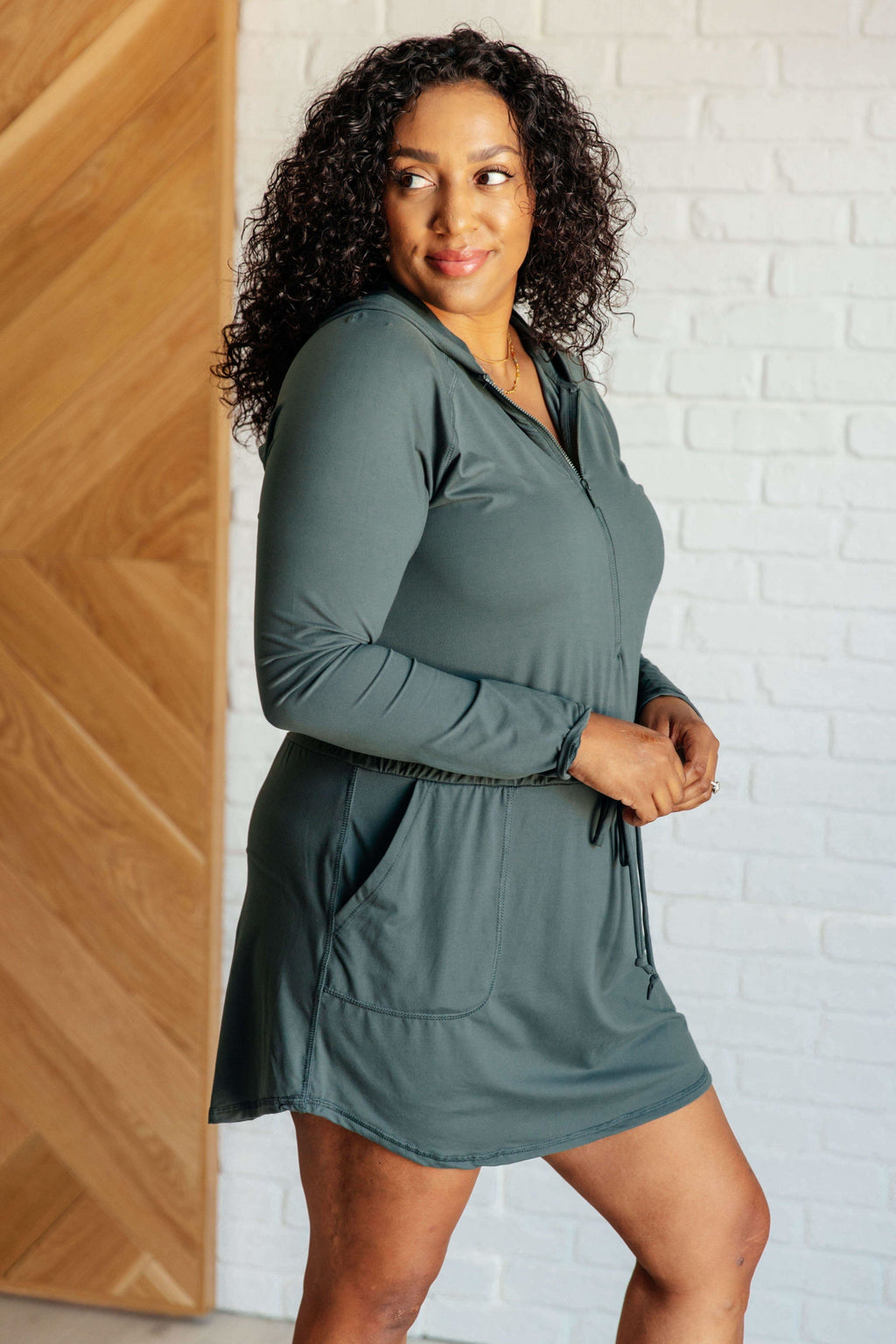 Getting Out Long Sleeve Hoodie Romper in Smoked Spruce in - Jumpsuits & Rompers photo
