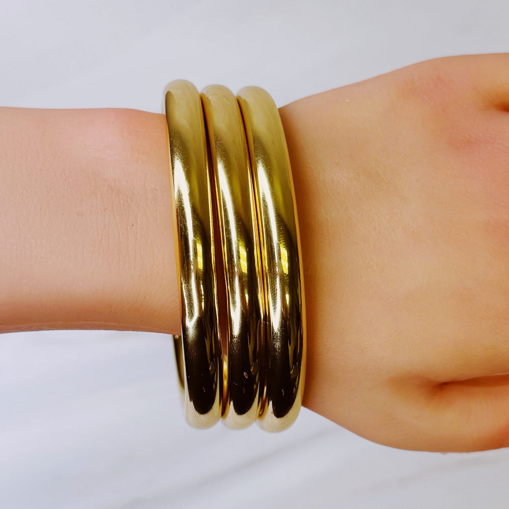 Golden Stack Luxe Bangle Set – Sleek Polished Gold-Tone Arm Candy in Classic Stacking Style in - Jewelry photo