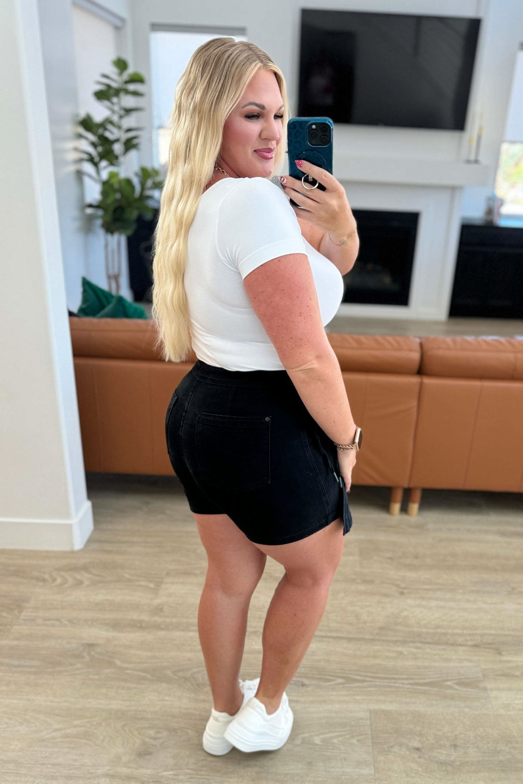 Bentli High Rise Side Tie Denim Skort in Black in - Denim photo