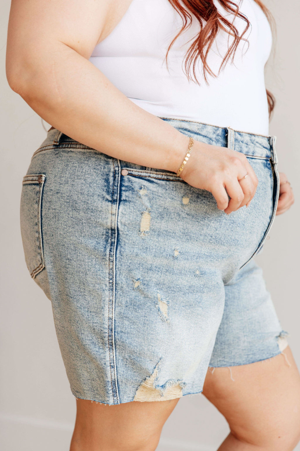 Cindy High Rise Mineral Wash Distressed Boyfriend Shorts in - Denim photo