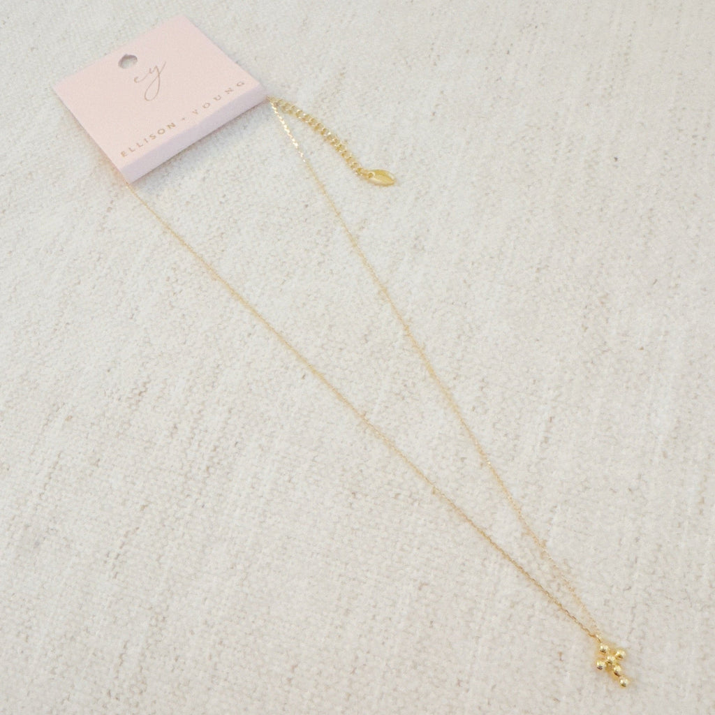 Mini Dot Cross Pendant Necklace in - Jewelry photo