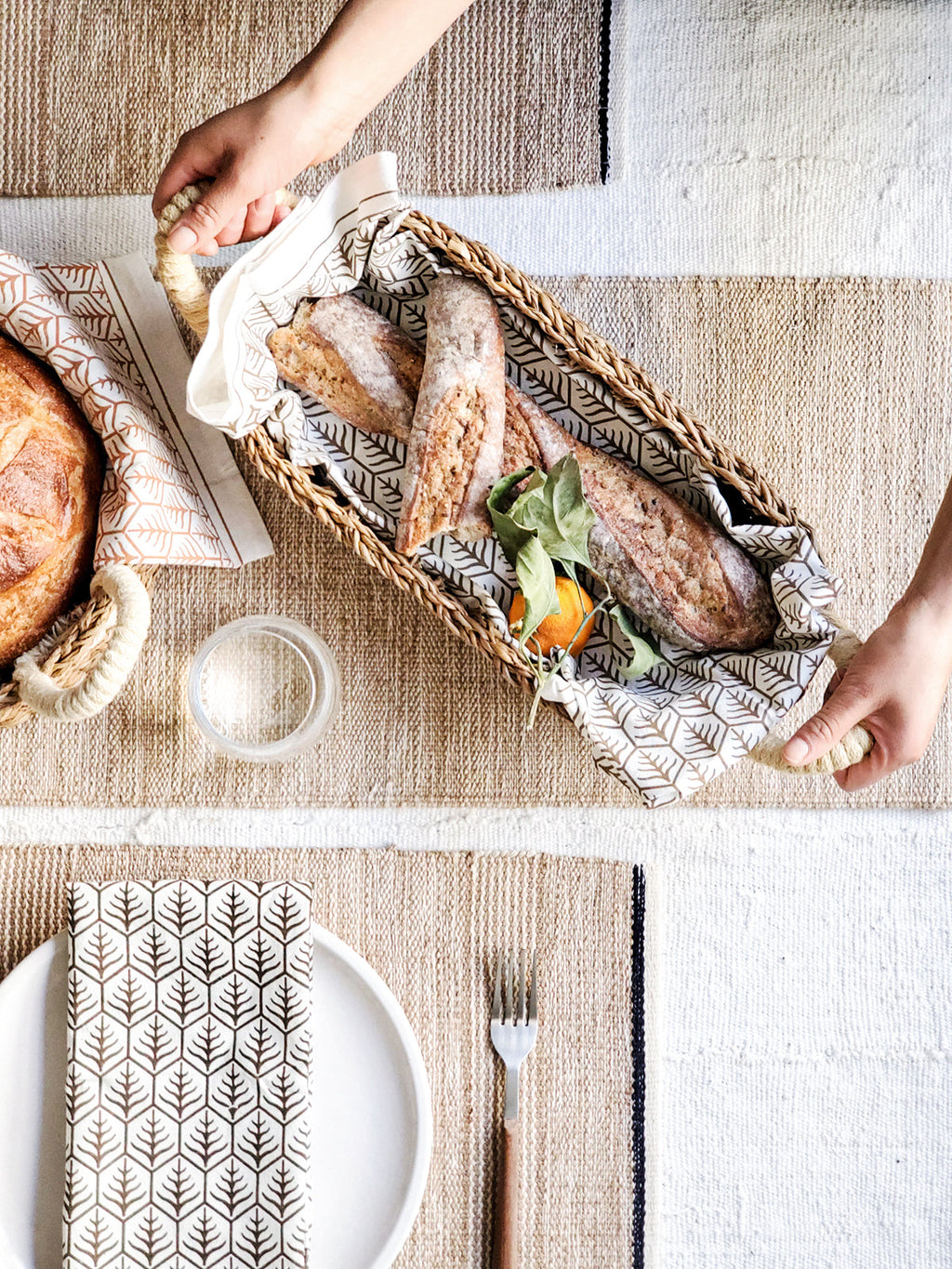 KORISSA Savar Bread Basket with White Handle in - Storage & Organization photo