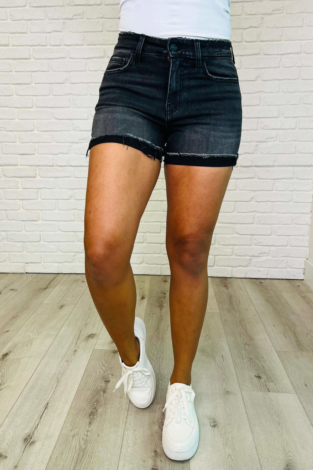 Sunset Stroll Distressed Hem Shorts in Washed Black in - Womens photo