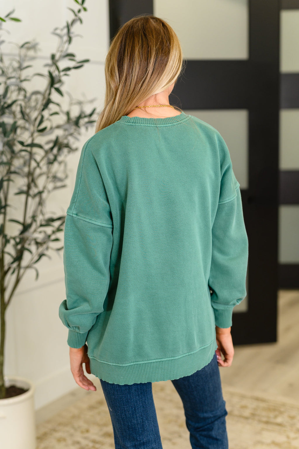 Talk Cozy to Me Stepped Hem Pullover in Dark Green in - Womens photo