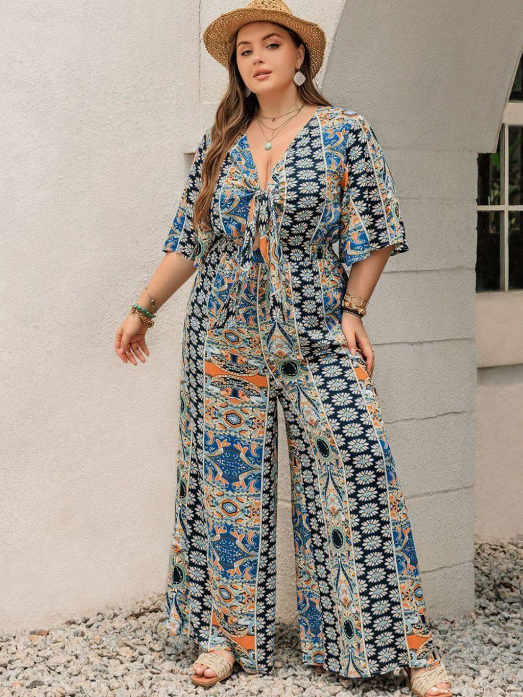 Plus Size Printed Half Sleeve Wide Leg Jumpsuit in - photo