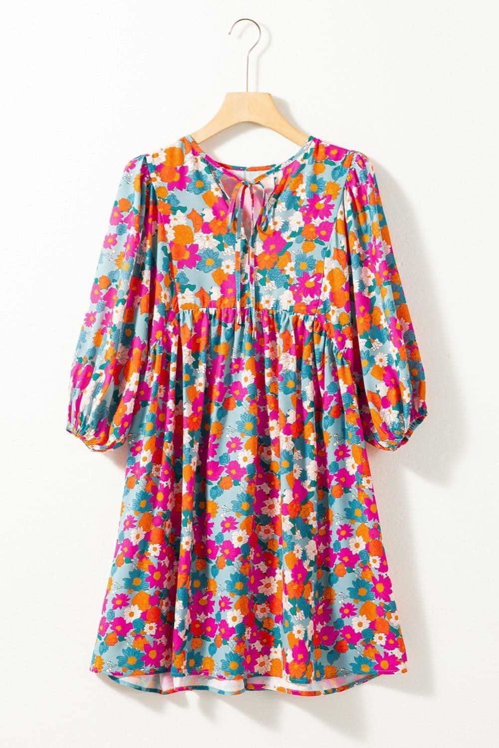 Aria Floral Tie Neck Puff Sleeve Mini Dress in - Mini Dresses photo