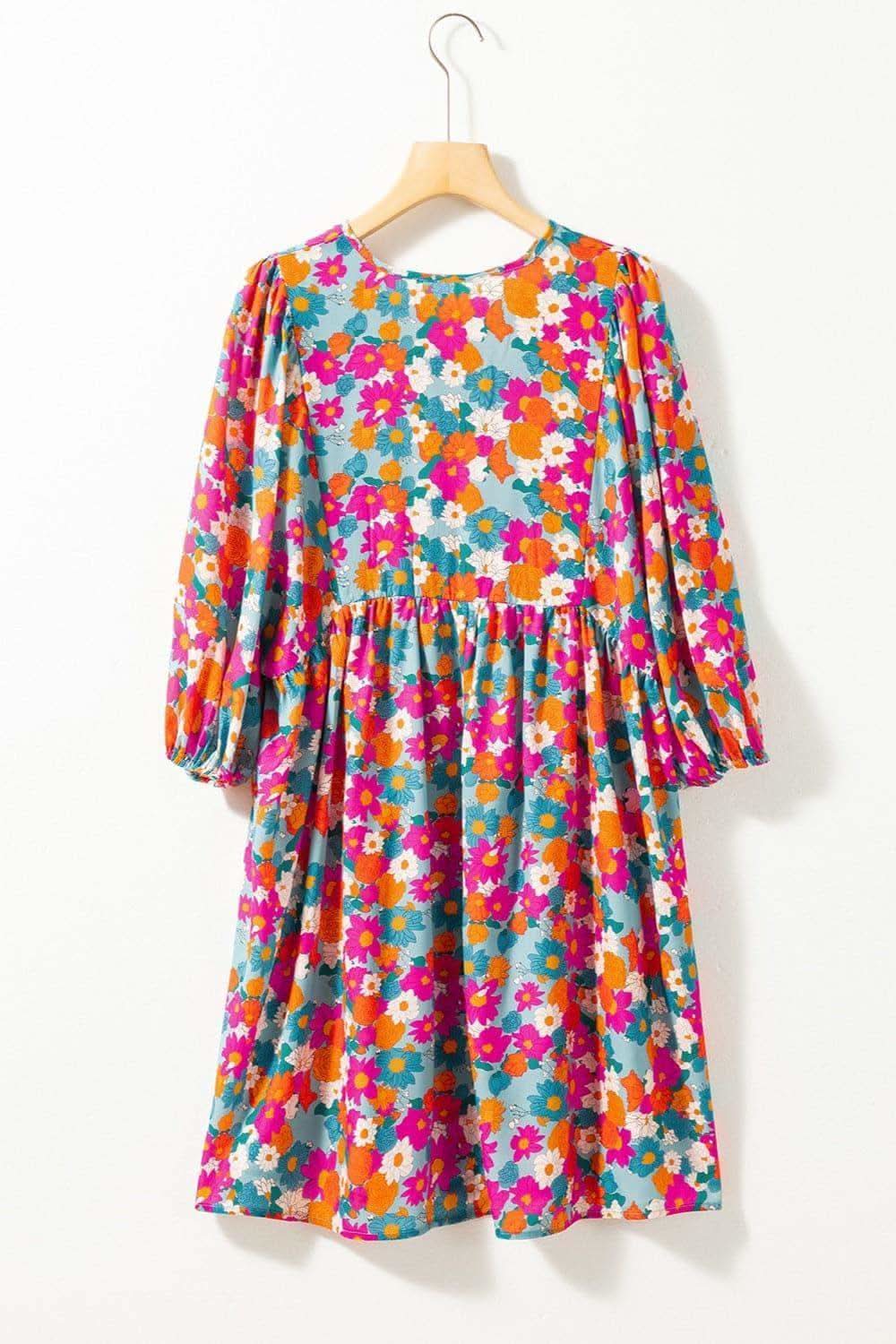 Aria Floral Tie Neck Puff Sleeve Mini Dress in - Mini Dresses photo