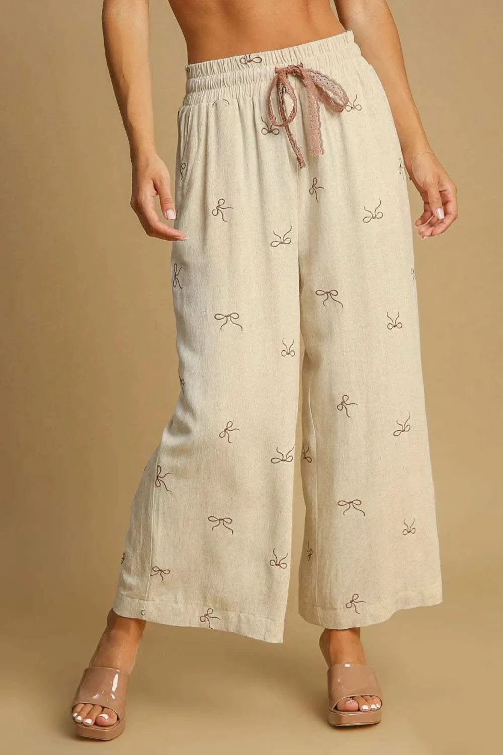 Umgee Full Size Lace Drawstring Embroidered Bow Wide Leg Pants Plus Size in OATMEAL - photo