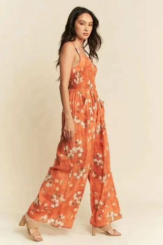 Davi & Dani Floral Ruffle Square Neck Smocking Bodice Jumpsuit - SwagglyLife Home & Fashion Davi & Dani Floral Ruffle Square Neck Smocking Bodice Jumpsuit - SwagglyLife Home & Fashion