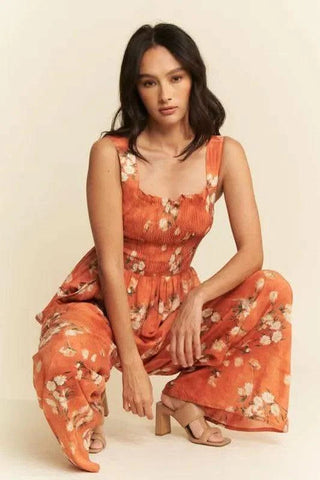 Davi & Dani Floral Ruffle Square Neck Smocking Bodice Jumpsuit - SwagglyLife Home & Fashion Davi & Dani Floral Ruffle Square Neck Smocking Bodice Jumpsuit - SwagglyLife Home & Fashion