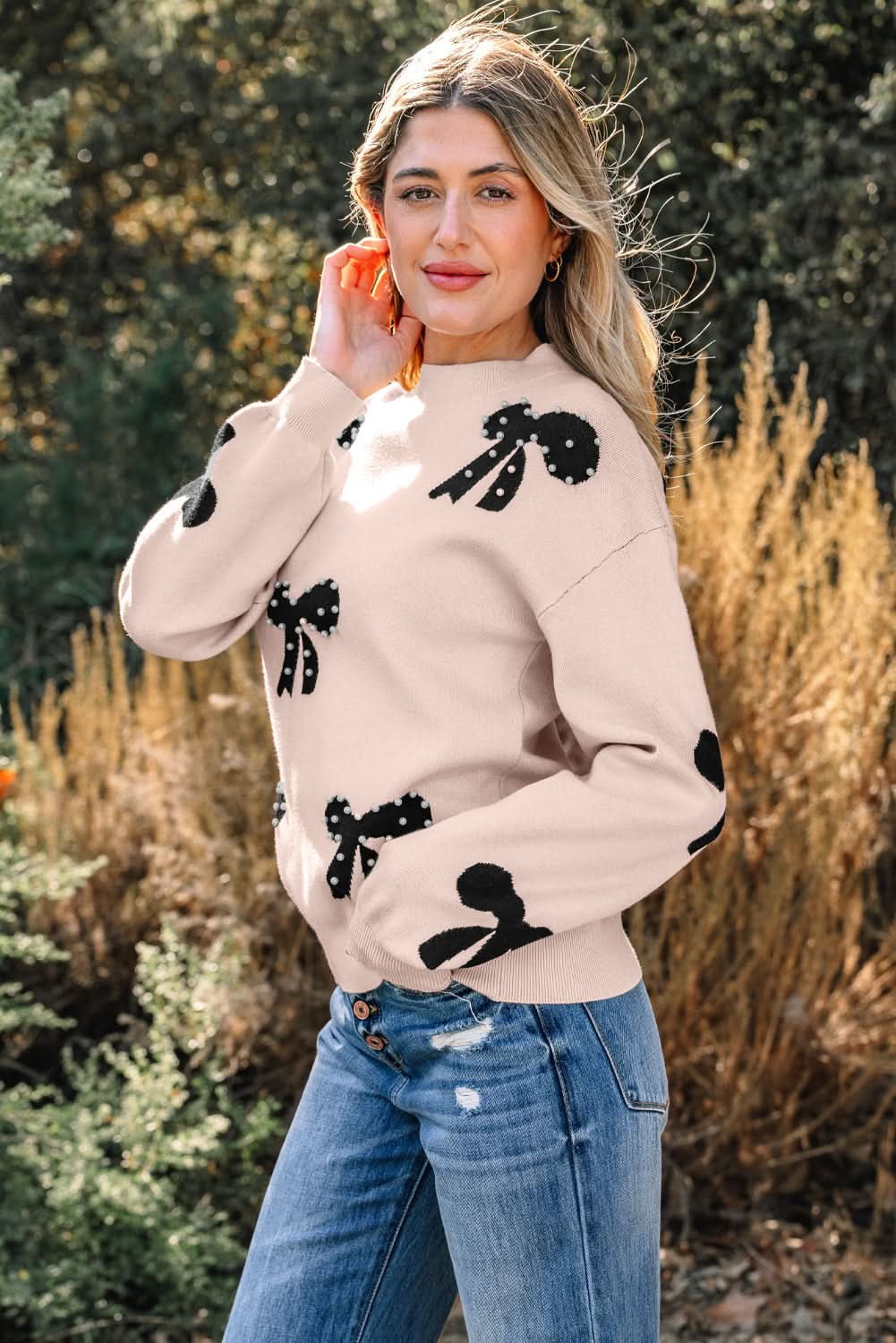 Eleanor Bow Pattern Loose Sweater in - Sweaters photo