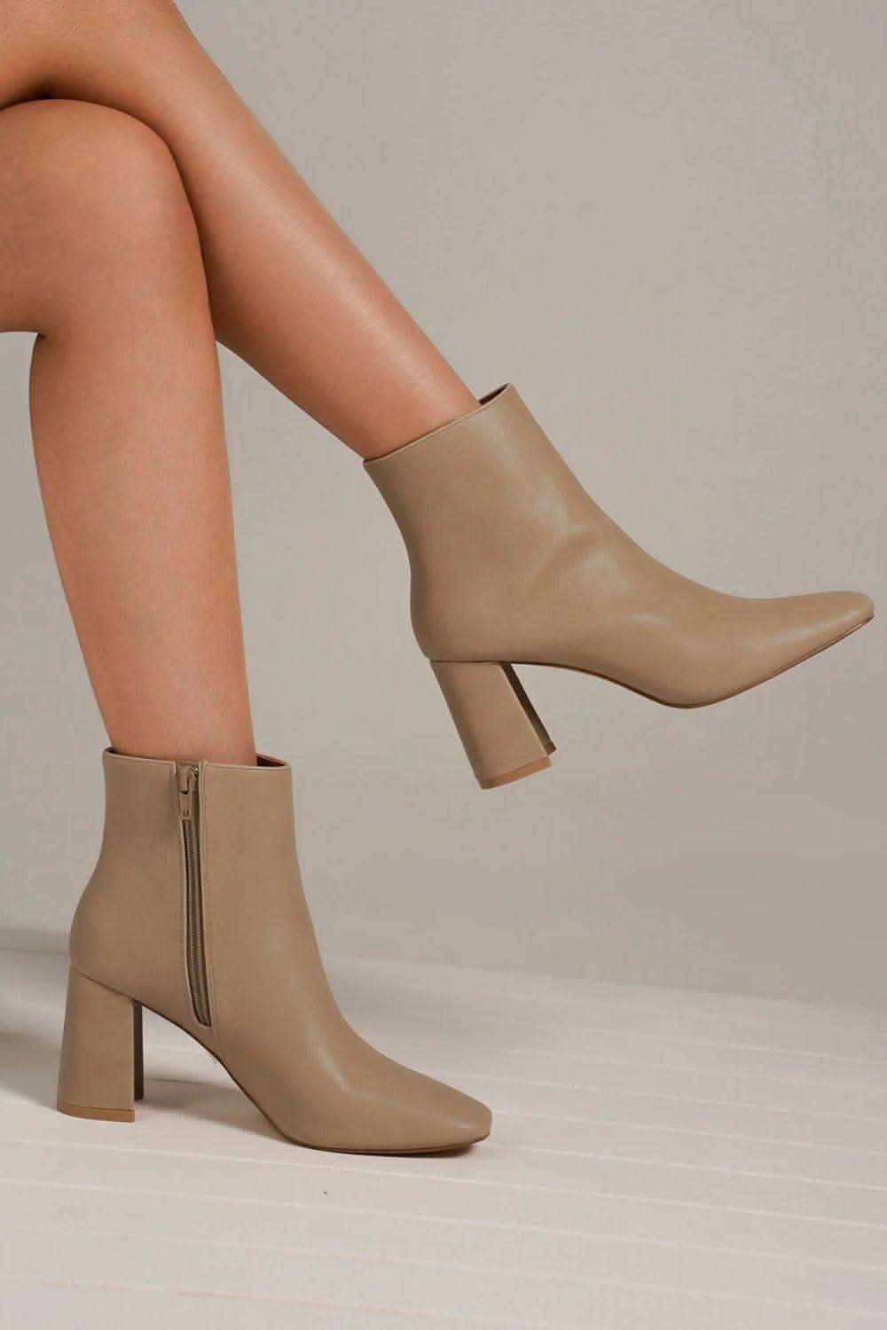 Beast Fashion PU Leather Block Heel Boots with Side Zippers in - photo