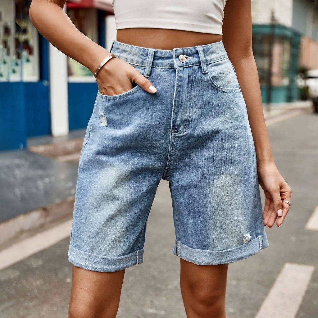 Distressed Buttoned Denim Shorts with Pockets in Medium - Shorts photo