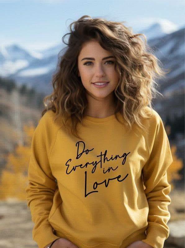 Do Everything In Love Premium Graphic Sweatshirt in Mustard - Shirts & Tops photo