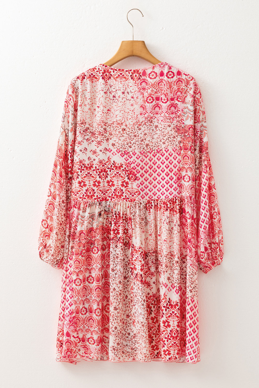 Melody Floral Tassel Tie Long Sleeve Mini Dress in - Dresses/Floral Dresses photo