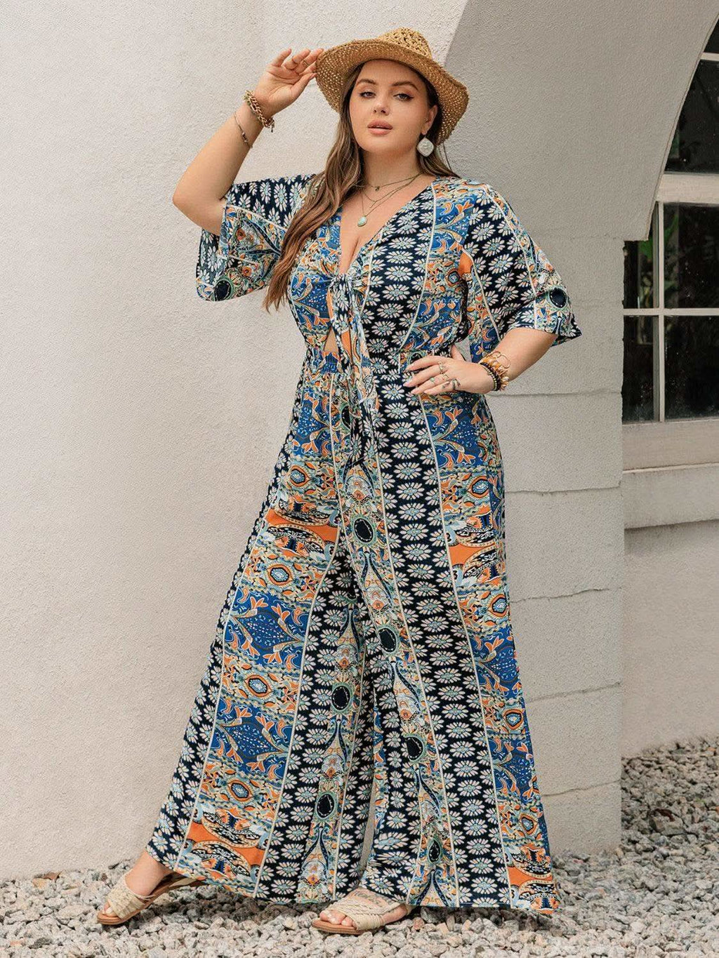 Plus Size Printed Half Sleeve Wide Leg Jumpsuit in - photo