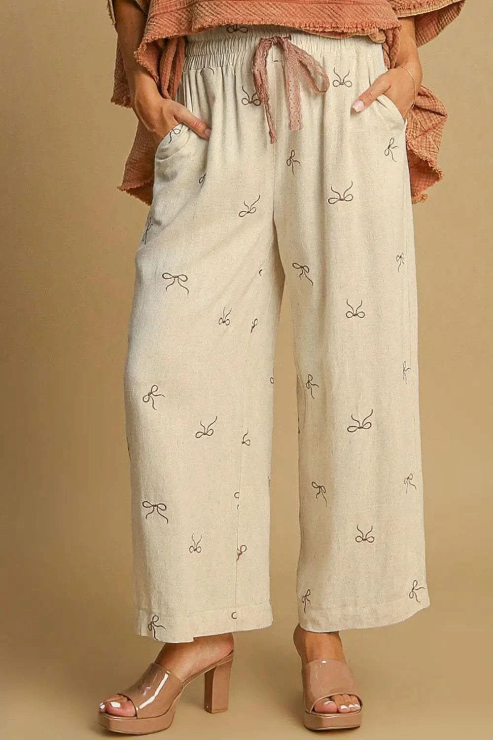 Umgee Full Size Lace Drawstring Embroidered Bow Wide Leg Pants Plus Size in - photo