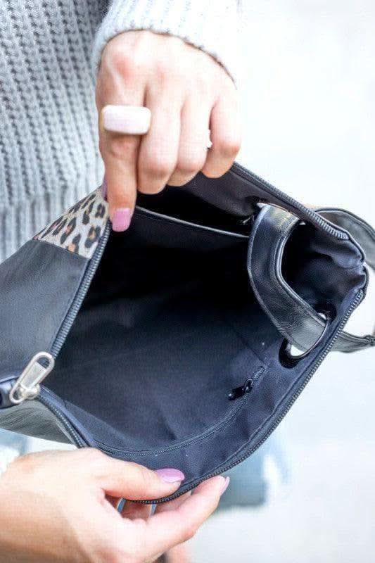 Leopard Dual Tone Clutch in - Handbags photo