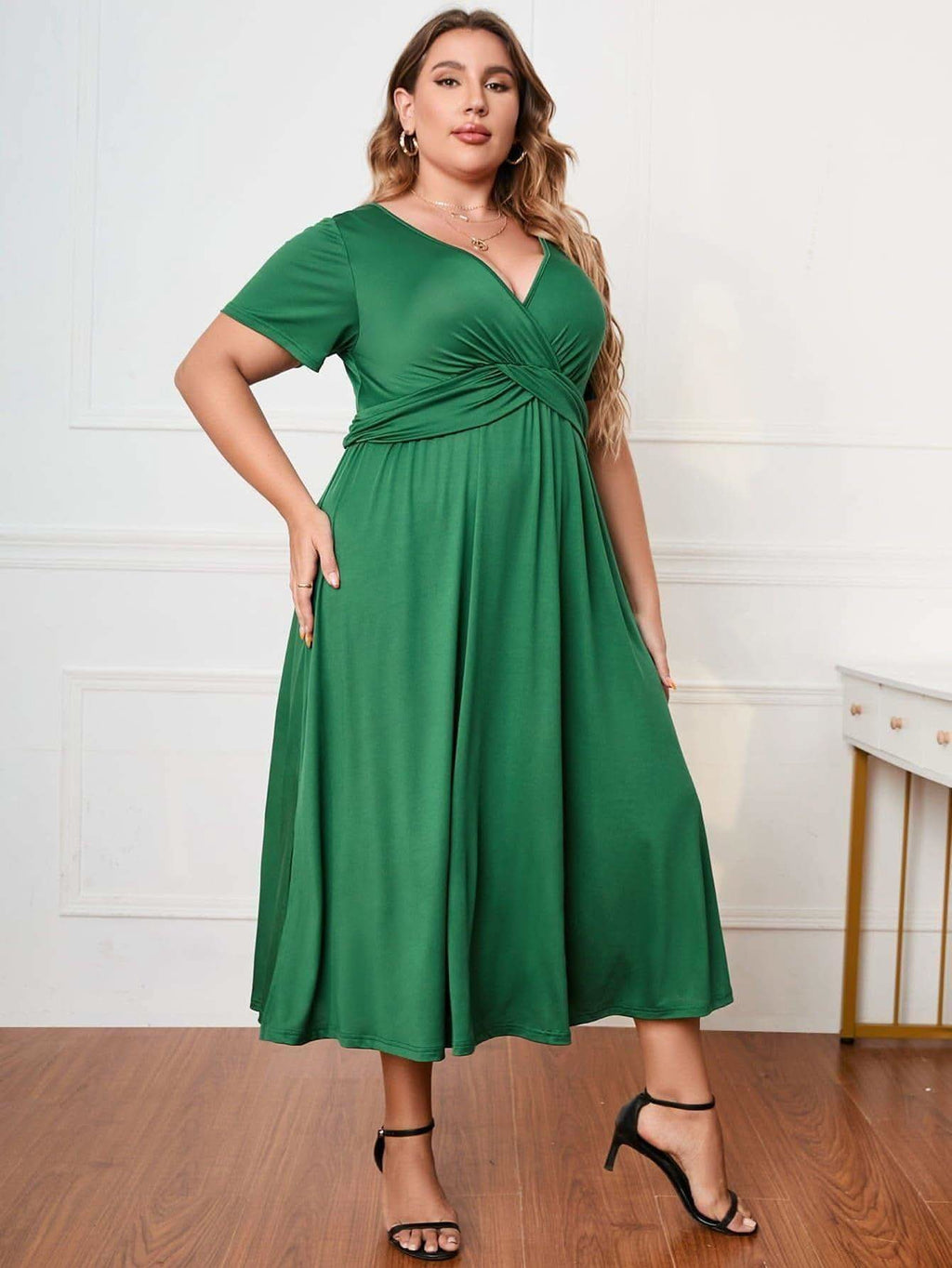 Plus Size Short Sleeve Surplice Neck Midi Dress in - Dresses photo