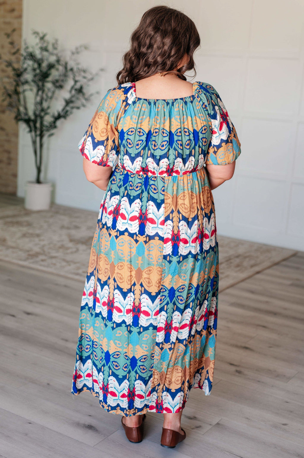 Shaping Reality V-Neck Balloon Sleeve Dress in - Dresses photo