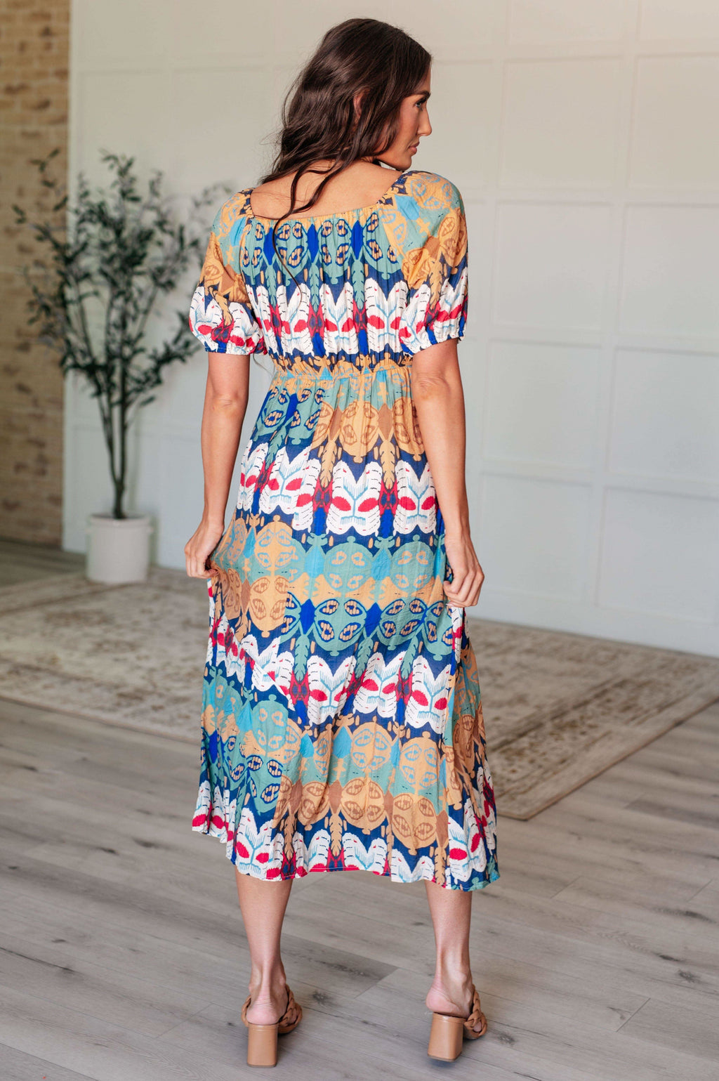 Shaping Reality V-Neck Balloon Sleeve Dress in - Dresses photo