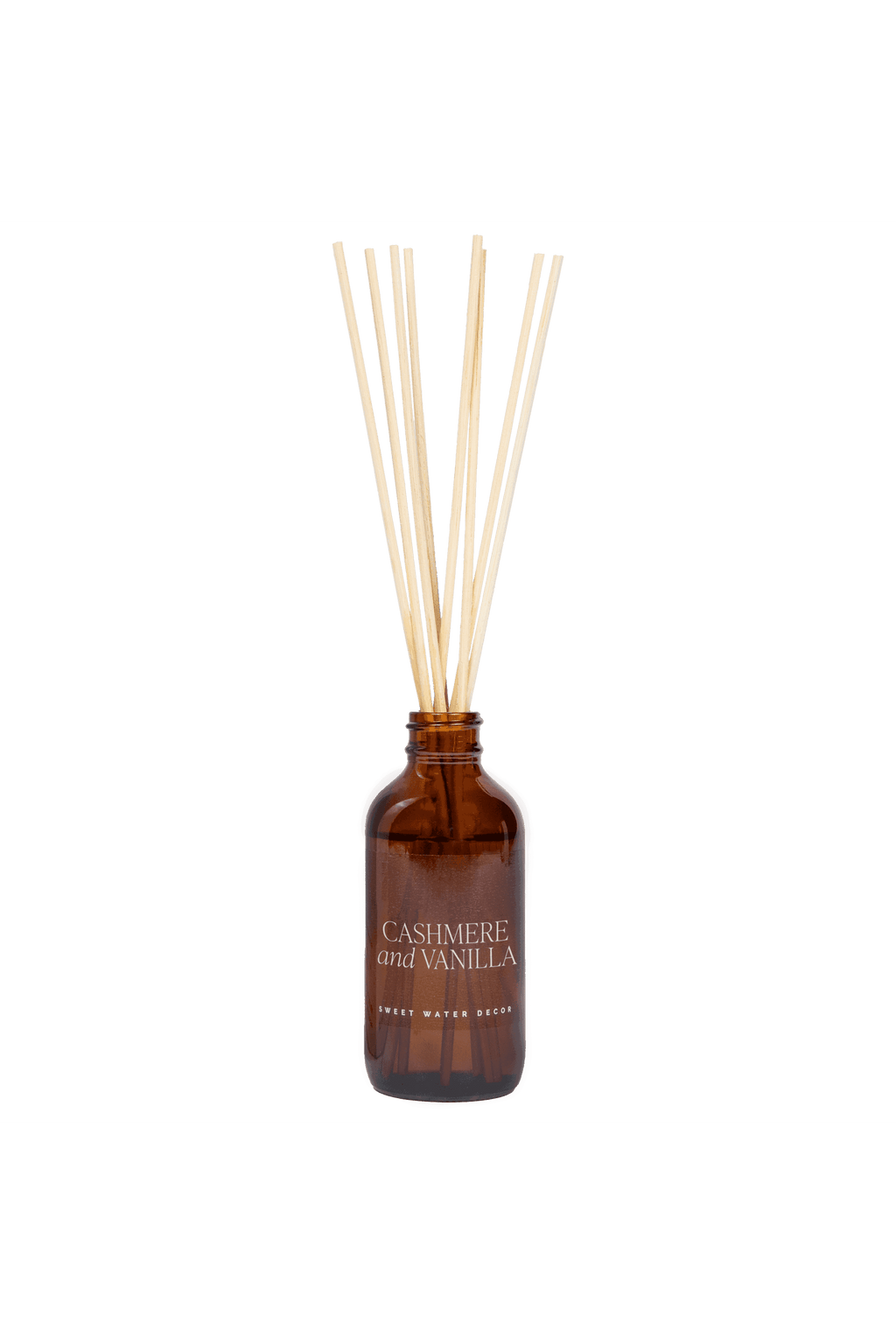 Sweet Water Decor Cashmere and Vanilla Amber Reed Diffuser in - Reed Diffusers photo