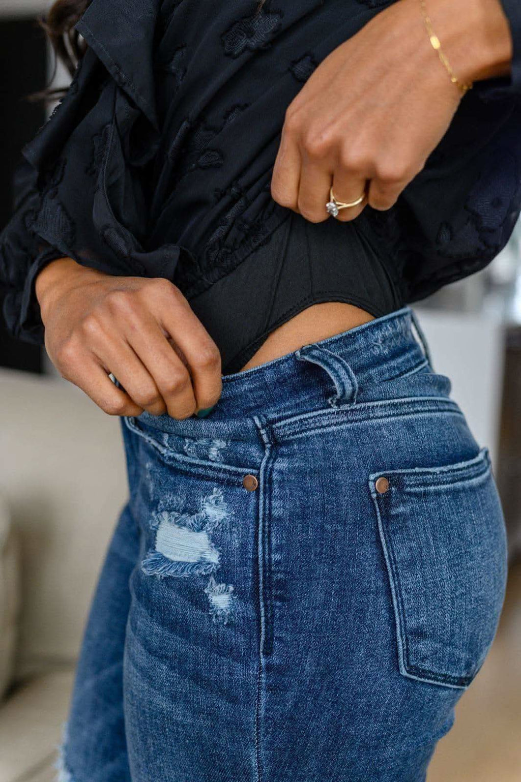 Think Of Me Ruffle Long Sleeve Bodysuit in Black in - Shirts & Tops photo