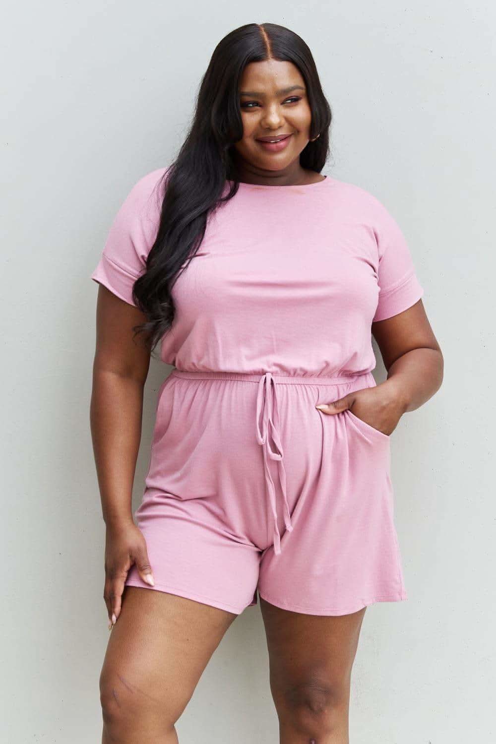 Zenana Chilled Out Full Size Short Sleeve Romper in Light Carnation Pink in - Jumpsuits & Rompers photo