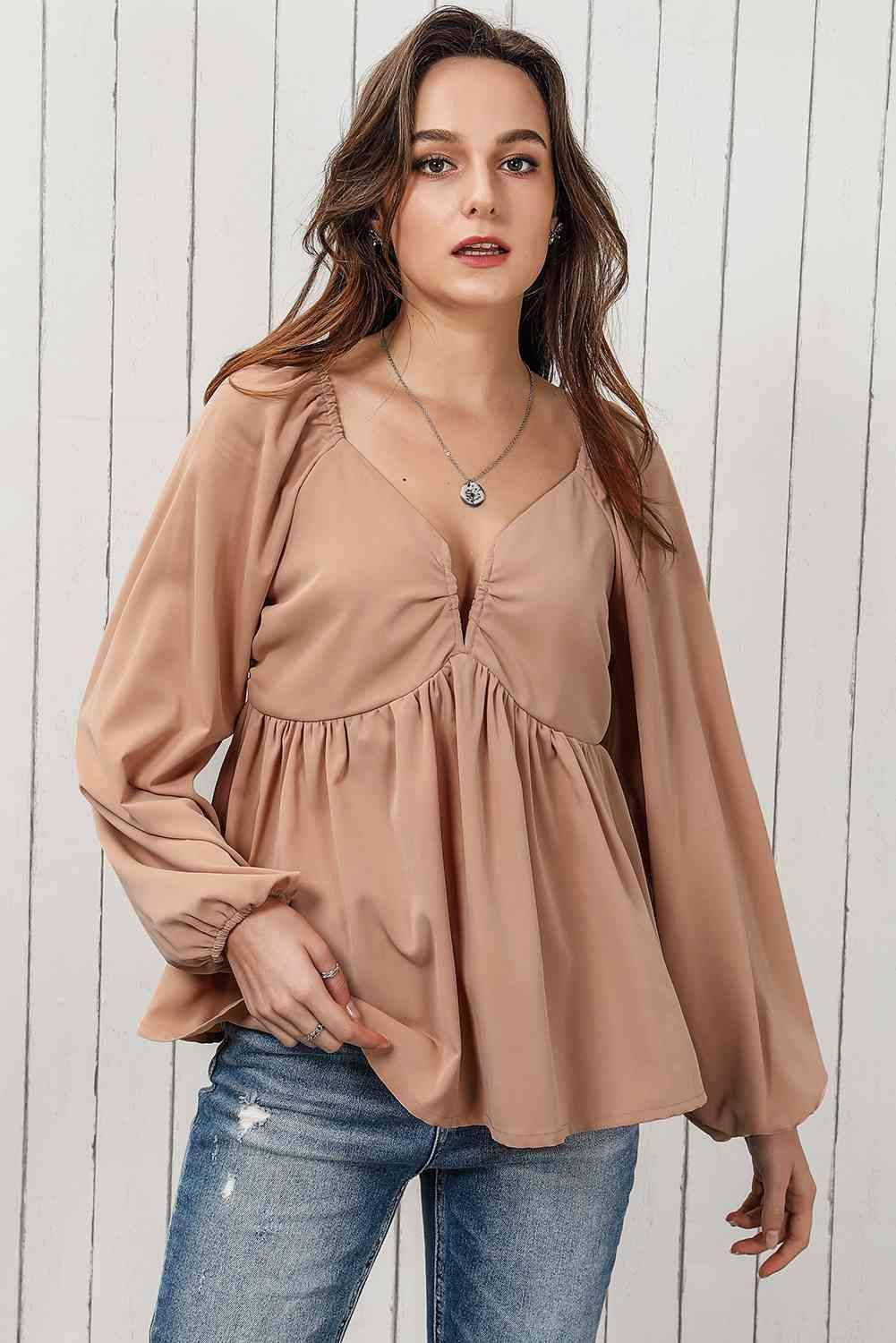 Double Take Tie Back Smocked Long Sleeve Babydoll Blouse in Tan - photo