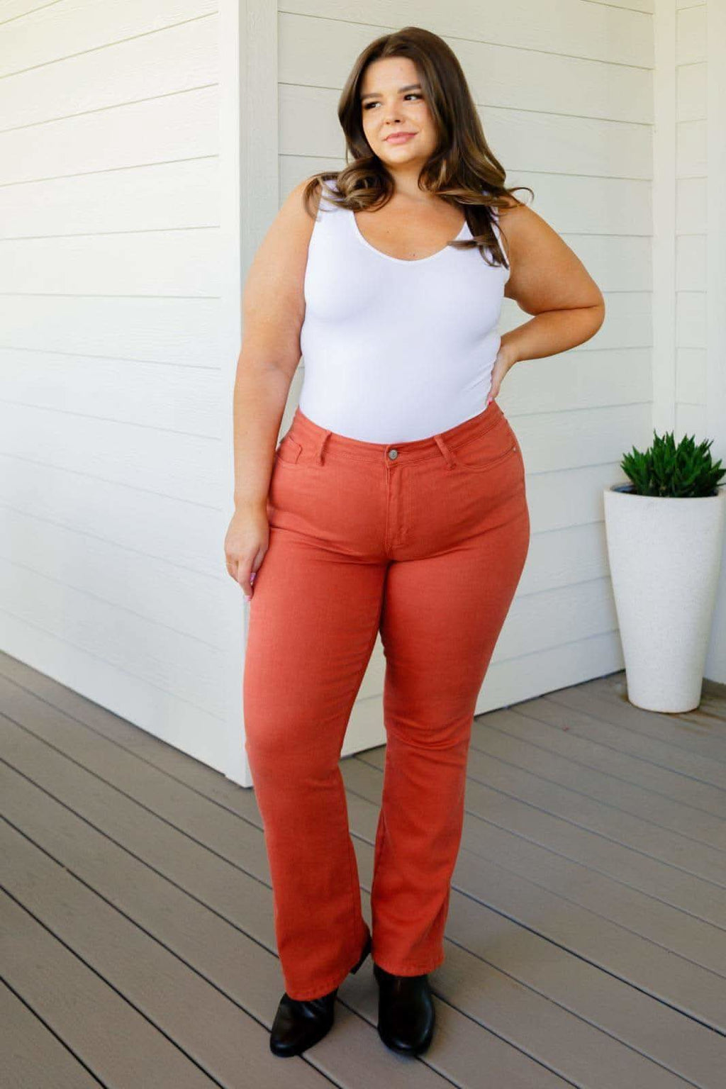 JUDY BLUE Autumn Mid Rise Slim Bootcut Jeans in Terracotta in - Pants photo