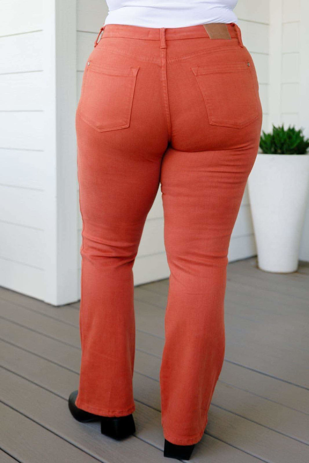 JUDY BLUE Autumn Mid Rise Slim Bootcut Jeans in Terracotta in - Pants photo