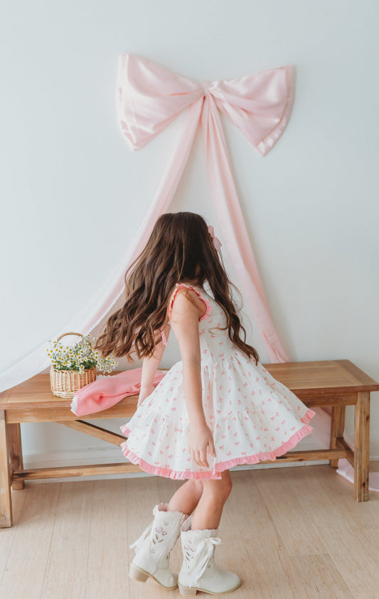 Jolie Bow Dress in - Dresses photo