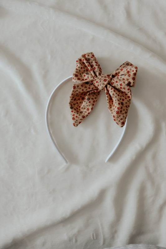 Poinsettia Headbands in Pinwheel hard satin headband - photo