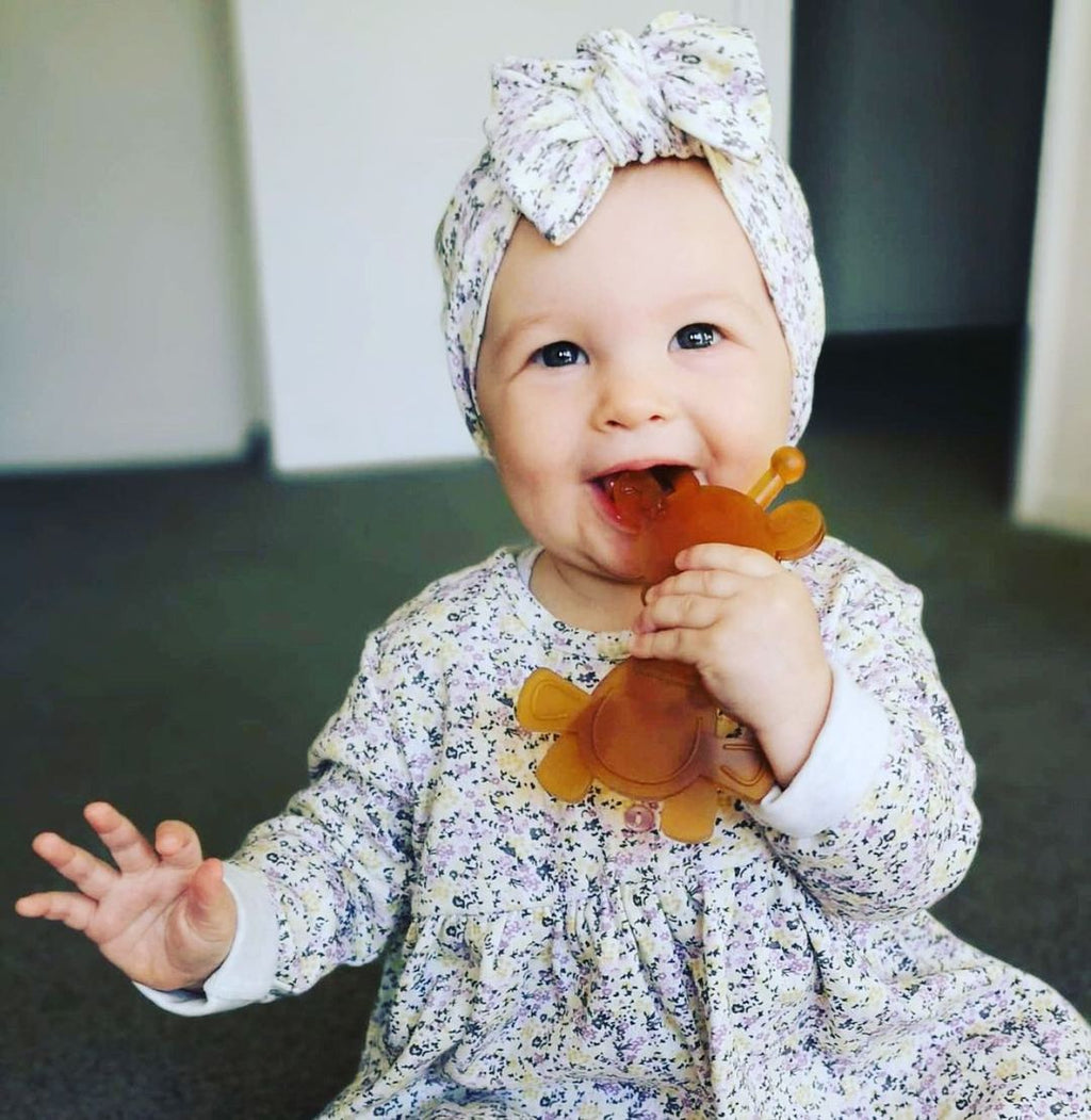 The Little Bamber - Natural Rubber & Baltic Amber Teething Toy in - Baby Teething Toy photo
