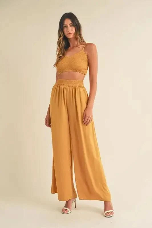 MABLE Smocked Bralette Crop Top and Wide Leg Pants Set in Gold Mustard - photo
