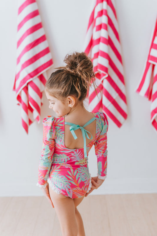 Pink Palm Paradise One Piece Rashguard Suit in - Swimwear photo